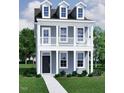 Inviting two-story home with a classic design and a charming covered porch at 304 White Oak Garden Way # 214, Garner, NC 27529