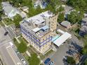 A captivating aerial view of the apartment building with rooftop patios and a convenient covered parking area at 312 N Buchanan Blvd # 302, Durham, NC 27701
