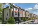 Townhome exteriors showcasing modern architecture with a blend of neutral tones and well-maintained landscaping at 777 Willard St, Durham, NC 27701