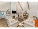 Inviting living room boasts high ceilings, stylish furniture, and a stone fireplace at 1101 Bessie Ct, Wake Forest, NC 27587