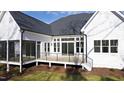 Expansive backyard with a screened in porch and deck that enhance outdoor living at 162 Lookout Rdg # 677, Pittsboro, NC 27312