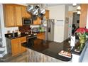 Well-equipped kitchen with stainless steel appliances and granite countertops at 2213 Oakhurst Trl, Hillsborough, NC 27278