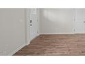 Entryway showing wood-look flooring and door at 6453 Alfalfa Ln, Wake Forest, NC 27587
