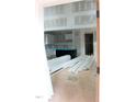 The kitchen is in the process of being completed; features include an island, white cabinets, and modern design at 105 Sherwood Ln, Hillsborough, NC 27278