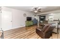 Spacious living room with hardwood floors and a ceiling fan at 2104 Live Oak Dr, Sanford, NC 27330
