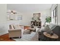 Comfortable living room with elegant furniture, a decorative rug, and natural light at 3622 Colchester St # 13, Durham, NC 27707
