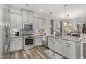 Modern kitchen features granite countertops, stainless steel appliances, and stylish backsplash at 501 Historic Dr, Hillsborough, NC 27278