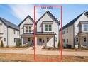 Charming two-story home with craftsman style details and a covered front porch at 857 Athens Dr # 102, Raleigh, NC 27606