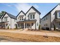 Charming two-story home with craftsman style details and covered front porch at 857 Athens Dr # 102, Raleigh, NC 27606