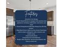 Granite island kitchen is equipped with stainless steel appliances, including a dishwasher, microwave, and range at 109 Perignon Dr, Princeton, NC 27569