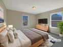 Bright bedroom featuring a large window, soft carpet, and ample space at 207 Lawrence St, Fuquay Varina, NC 27526