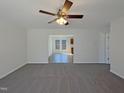 Spacious living room showcases an open layout with an easy transition into dining and kitchen areas at 207 Lawrence St, Fuquay Varina, NC 27526