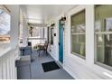Inviting front porch with a bench, providing a cozy outdoor seating area at 302 St Augustine Ave, Raleigh, NC 27610