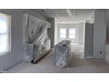 Spacious, unfinished kitchen with central island and many windows at 304 Chesapeak Commons St # 146, Garner, NC 27529