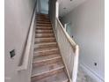 View of a staircase with temporary coverings during construction at 304 Chesapeak Commons St # 146, Garner, NC 27529