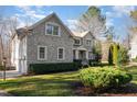 Beautiful two-story home with attached garage and lush green lawn at 4009 Brittabby Ct, Raleigh, NC 27606