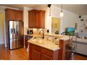 Well-appointed kitchen featuring granite countertops, stainless steel appliances, and ample cabinet space at 4305 Albino Deer Way, Wake Forest, NC 27587