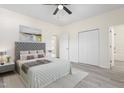 Comfortable bedroom with a plush bed, soft lighting, and spacious closets for ample storage at 605 Lee St, Burlington, NC 27215