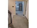 Inviting entryway featuring tiled floor that leads into the kitchen at 4100 Five Oaks Dr # 50, Durham, NC 27707