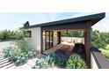Relaxing rooftop deck with ample seating, modern lighting, a ceiling fan, and serene landscaping at 615 Velma Hopkins Ln, Raleigh, NC 27603