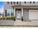 Close-up of the home's welcoming front door, showcasing its charming curb appeal at 1 Baylis St, Franklinton, NC 27525