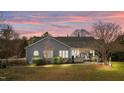 Spacious backyard featuring a cozy deck perfect for outdoor relaxation and entertainment at 2490 Earpsboro Rd, Zebulon, NC 27597