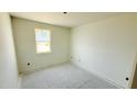 Bright bedroom with a window, offering natural light and a blank canvas for personalization at 120 Gobbler Dr, Smithfield, NC 27577
