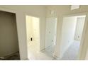 Hallway leading to various rooms showcases multiple entryways and open spaces at 120 Gobbler Dr, Smithfield, NC 27577