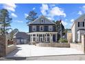 Beautiful two-story home with a welcoming front porch and well-manicured lawn at 5904 River Lake Cir, Raleigh, NC 27604