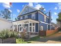 Two-story home showcasing a spacious porch and attractive exterior at 5904 River Lake Cir, Raleigh, NC 27604