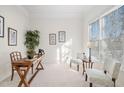Bright office space with a large window and neutral decor at 601 Walcott Way, Cary, NC 27519