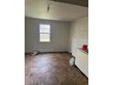 This bright room features lots of light from the large window, with an electric heater at 749 Southerland St, Henderson, NC 27536