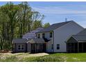 New construction home features a screened in porch, and an attached 1 car garage at 1063 Fairhaven Dr # 54, Mebane, NC 27302