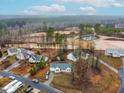 Aerial view of a well-maintained home with a large backyard surrounded by trees and a peaceful neighborhood at 2576 Mint Julep Dr, Creedmoor, NC 27522