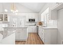 Bright, updated kitchen with granite counters, stainless appliances and modern lighting at 316 Russ Rd, Smithfield, NC 27577