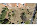 Aerial view of property showing landscape with dirt, trees, and a trampoline at 4622 Durham Rd, Wake Forest, NC 27587