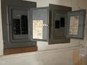 View of the electric circuit breaker panel for the house showing multiple switches and labels at 922 N White St, Wake Forest, NC 27587