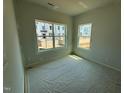 Bright bedroom with large windows offering lots of natural light at 312 Chesapeak Commons St # 144, Garner, NC 27529