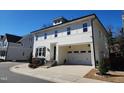 Stunning two-story home featuring a built in garage and professionally landscaped yard at 1317 Pecora Ln, Raleigh, NC 27607