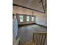 Spacious two-car garage with ample lighting, perfect for parking and storage needs at 190 Sage Ln # 015, Four Oaks, NC 27524
