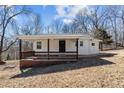 Charming single-story home with a cozy front porch and natural light at 2810 Hickory Hill Rd, Burlington, NC 27215