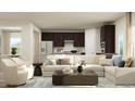 Bright and airy living room featuring a plush sectional sofa, modern decor, and an open-concept design at 632 Emerald Bay Cir, Raleigh, NC 27610