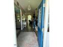 Welcoming foyer with chandelier, showcasing the home's open layout and stylish decor at 70 Maxwell Pl, Lillington, NC 27546