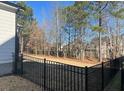 Fenced backyard showing a peaceful outdoor space at 145 Plantation Dr, Youngsville, NC 27596