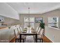 Bright dining room with hardwood floors, modern decor, and ample natural light at 1614 W Cotton Gin Dr, Clayton, NC 27527