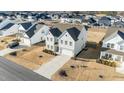 A beautiful aerial view showcases this home's location within a vibrant residential neighborhood at 158 Arlie Ln, Lillington, NC 27546