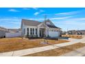 Charming single Gathering home with beautiful curb appeal, manicured lawn and two car garage at 1727 Pinecliff Ct, Fuquay Varina, NC 27526