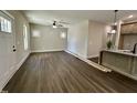 Spacious open-concept living room with new floors and lots of natural light at 315 S Maple Ave, Kenly, NC 27542