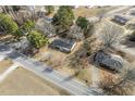 An aerial view shows the home's placement among mature trees and the surrounding neighborhood at 11254 Hwy Nc 50, Benson, NC 27504