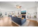 Bright and airy living room featuring an open floor plan and a cozy fireplace at 2715 Edmund St, Durham, NC 27705